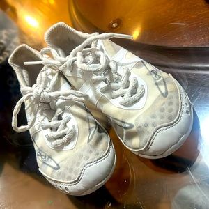 Infinity size y1 cheer shoes, my daughter out grew them. Used but good condition
